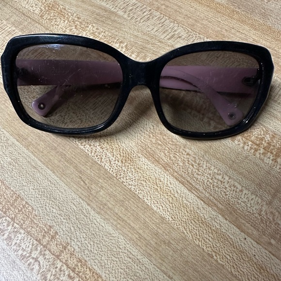 Coach sunglasses black with pink on the inside